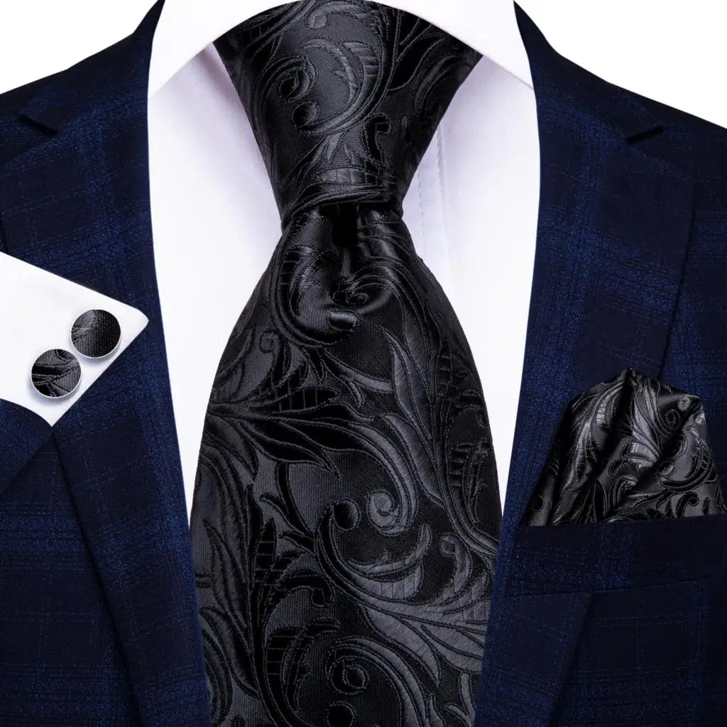 Black Floral Design Tie made from jacquard woven silk. Includes Matching Cuff Links and Pocket Square