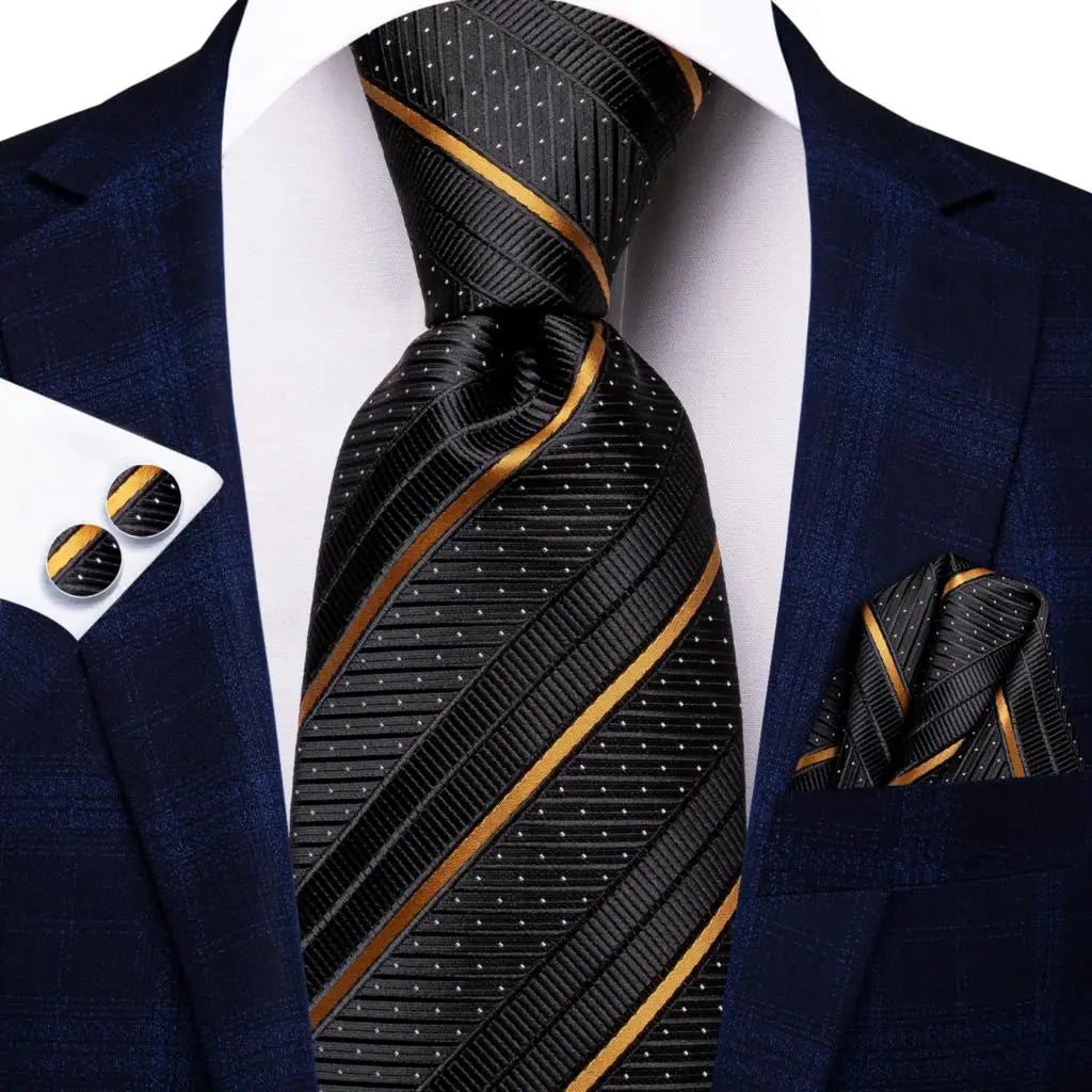 Black and Gold Striped Tie made from jacquard woven silk. Includes Matching Cuff Links and Pocket Square