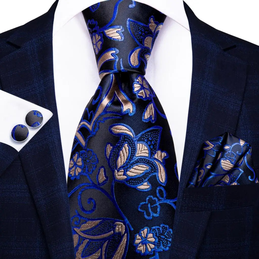 Black and blue floral design silk tie with matching cuff links and pocket square