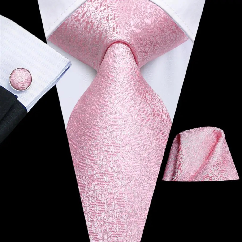 Light pink floral design tie with matching cuff links and pocket square