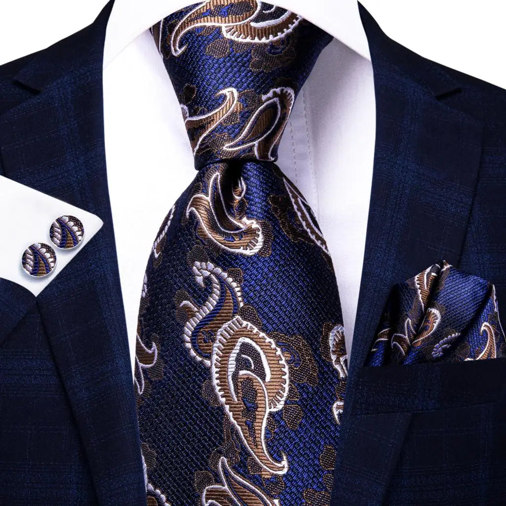 blue and brown paisley tie with matching cuff links and pocket square