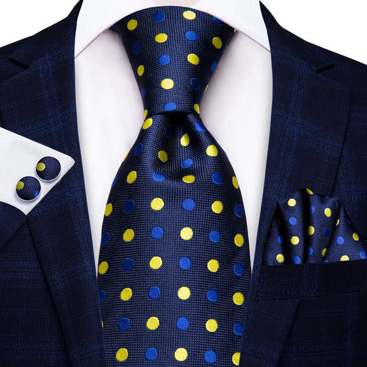 blue and yellow polka dot pattern tie with matching cuff links and pocket square