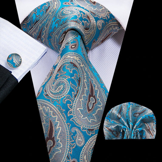 blue paisley tie with cuff links and pocket square