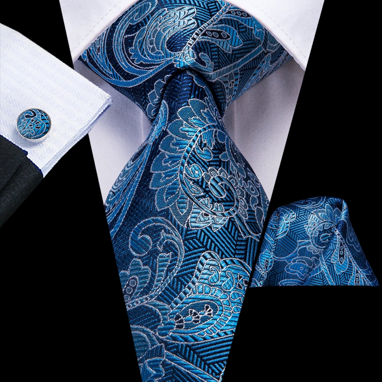 dark blue paisley tie with cuff links and pocket square