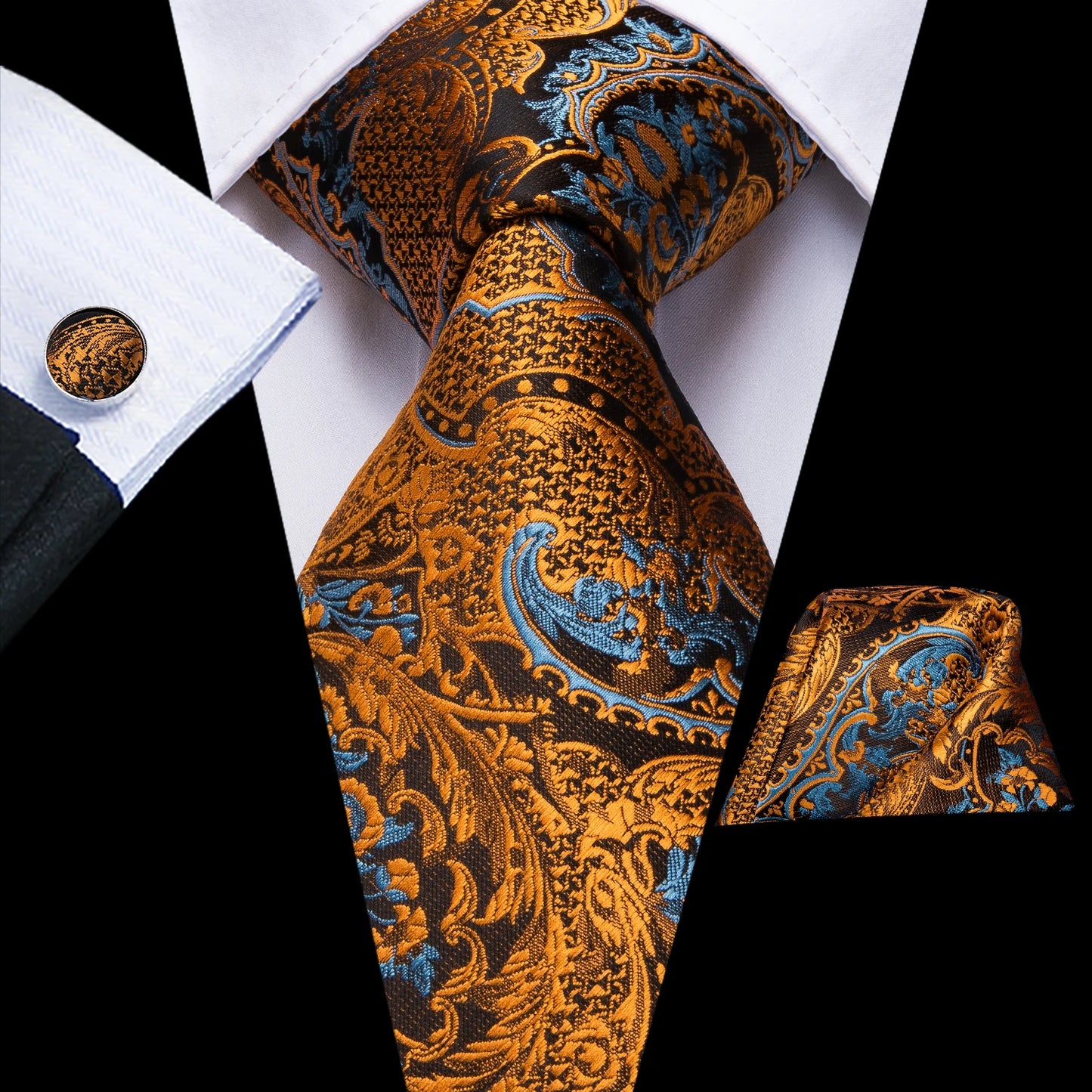 gold and blue paisley tie with cuff links and pocket square