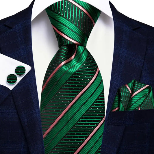 green and pink striped tie with matching cuff links and pocket square