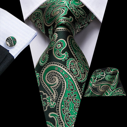 green paisley tie with cuff links and pocket square