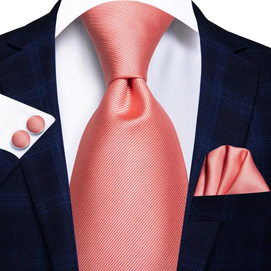 pink textured design tie with matching cuff links and pocket square