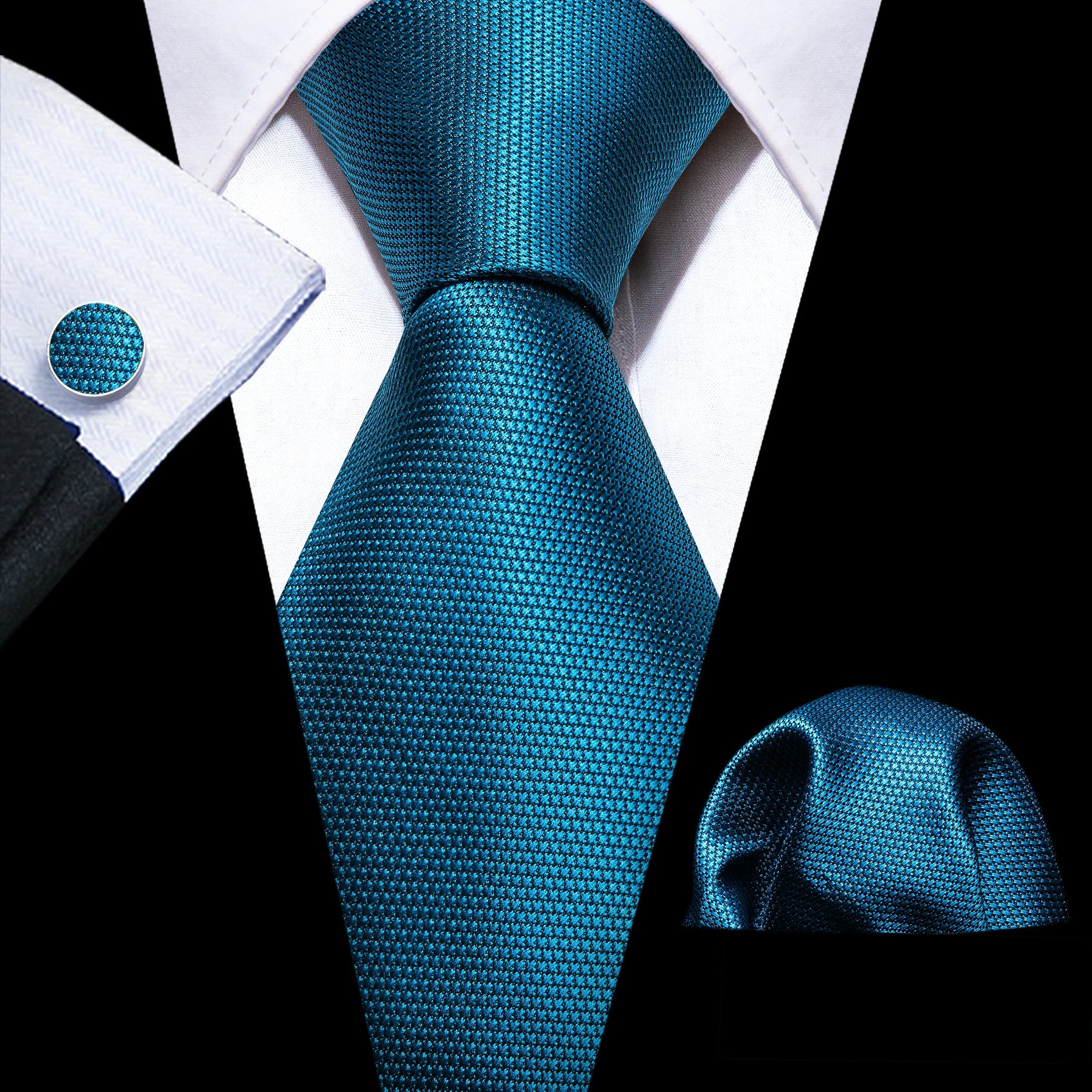 plain dark turquoise tie with matching cuff links and pocket square