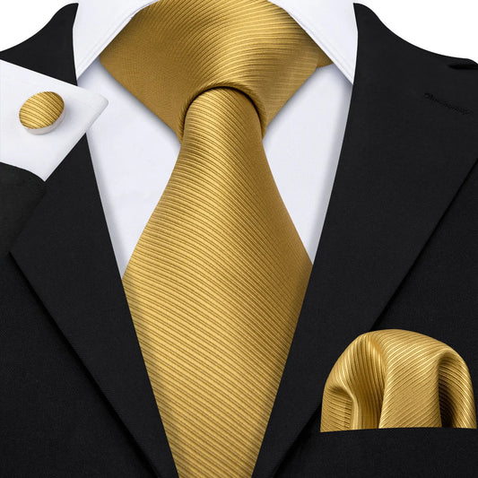 plain gold textured tie with cuff links and pocket square