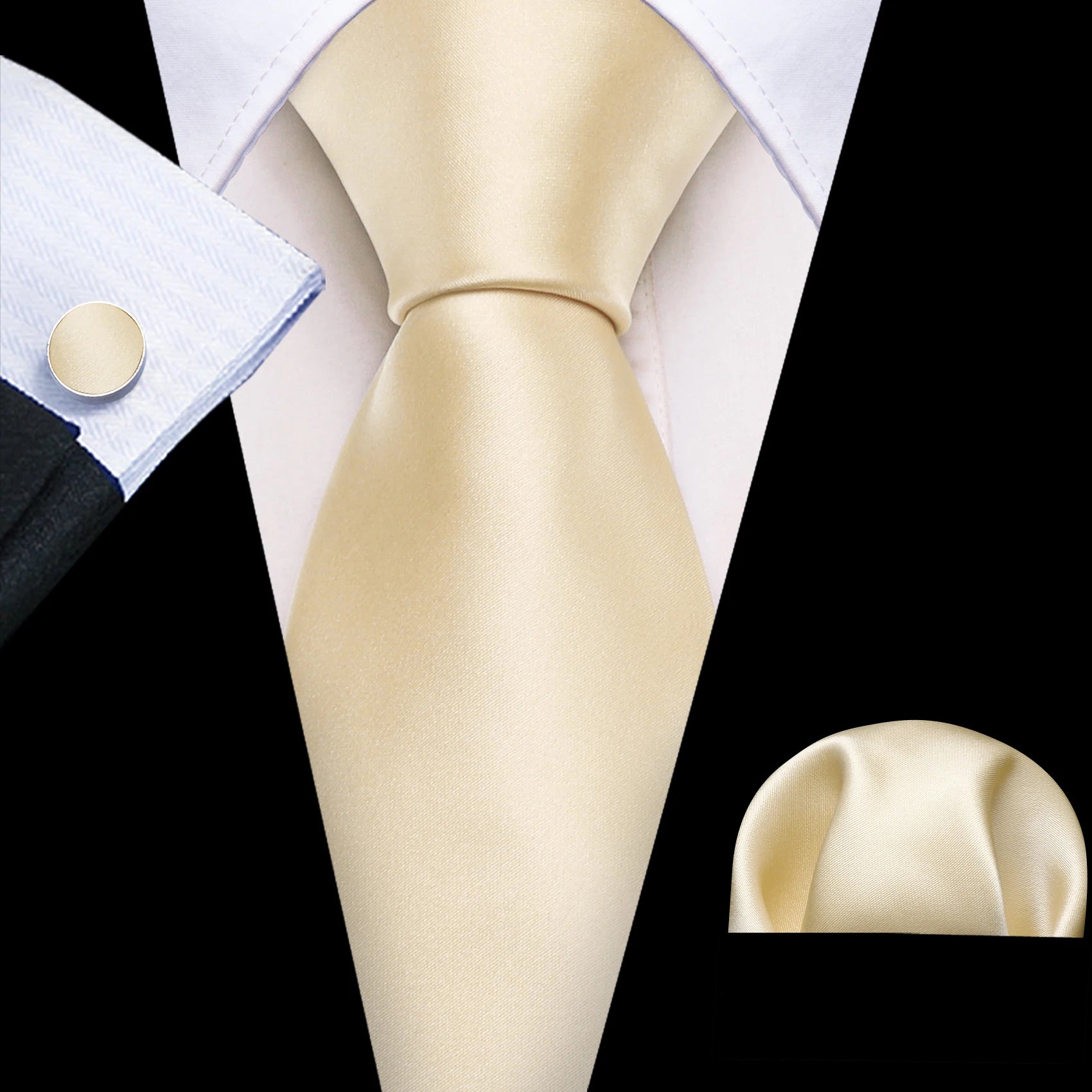 plain light gold tie with matching cuff links and pocket square