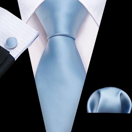 plain pale blue tie with cuff links and pocket square