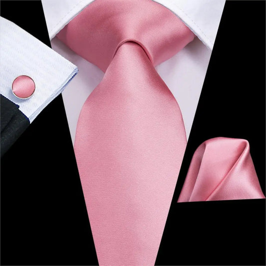 plain pink tie with matching cuff links and pocket square