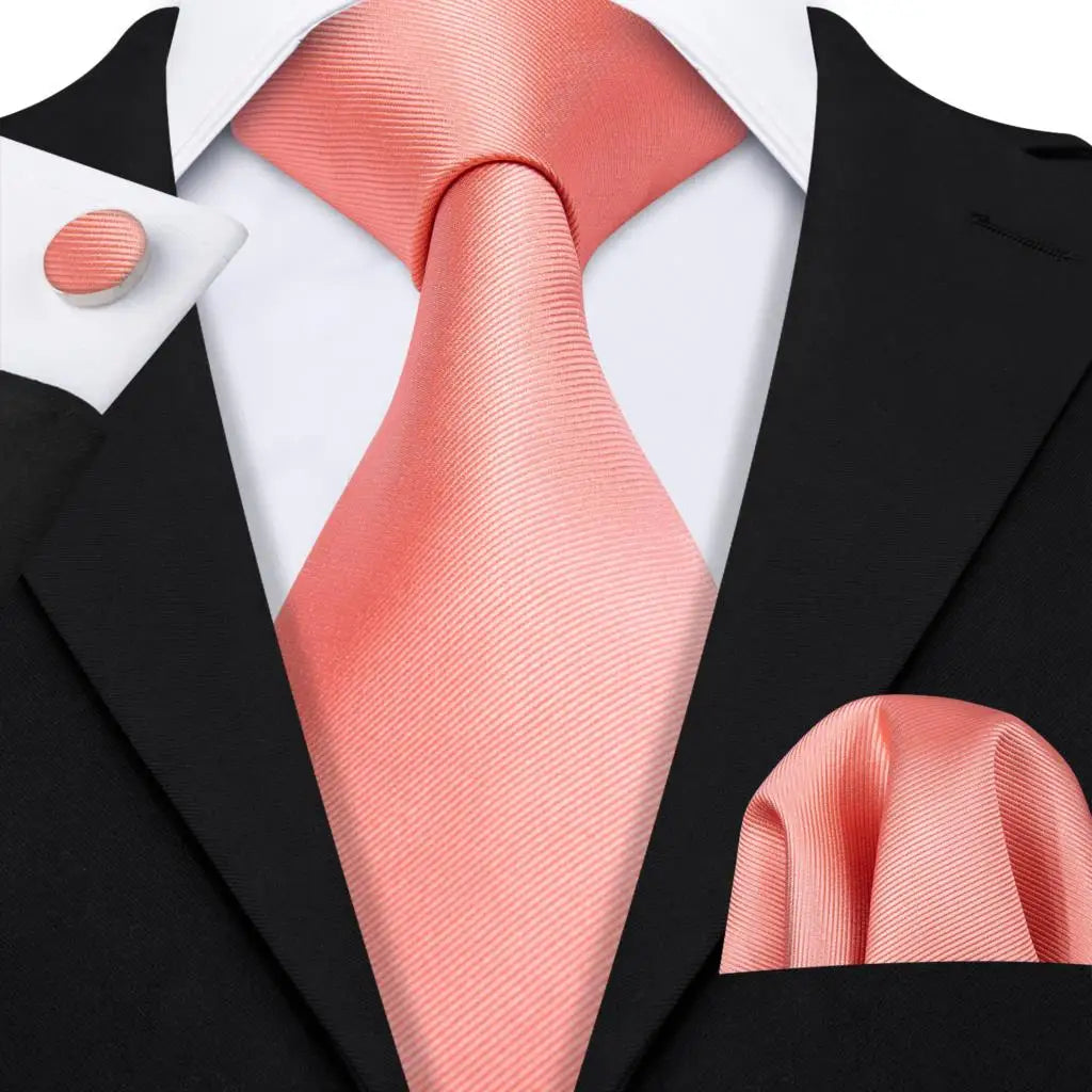 plain salmon pink textured tie with cuff links and pocket square