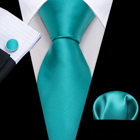 plain turquoise tie with cuff links and pocket square