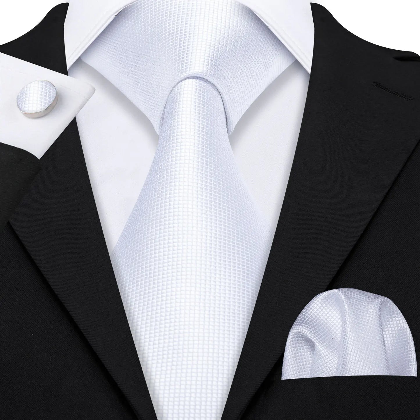 plain white textured tie with cuff links and pocket square