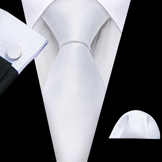 plain white tie with matching cuff links and pocket square