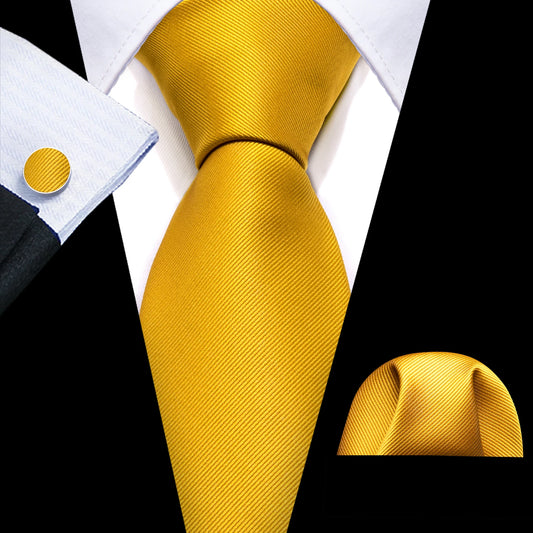 plain yellow tie with matching cuff links and pocket square