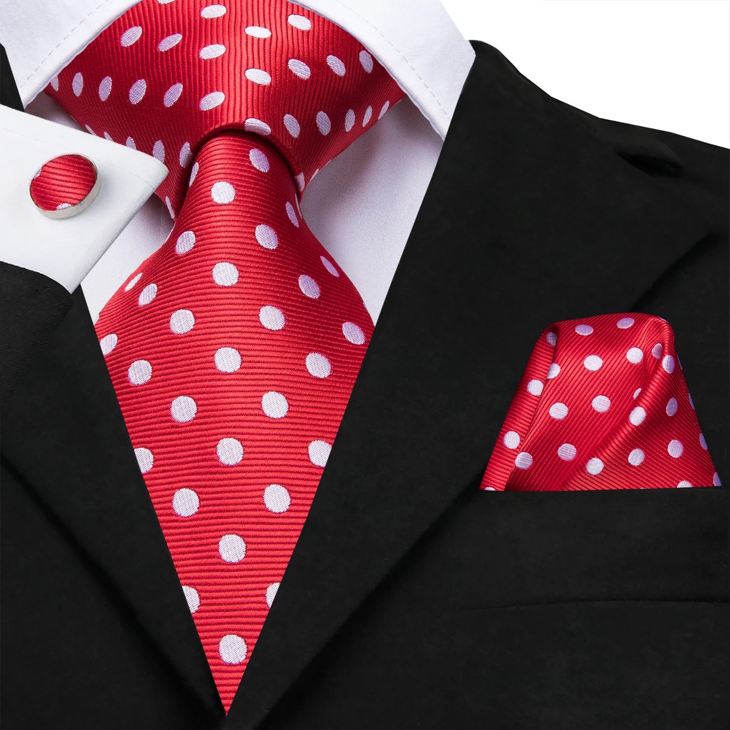 red and white polka dot tie with cuff links and pocket square