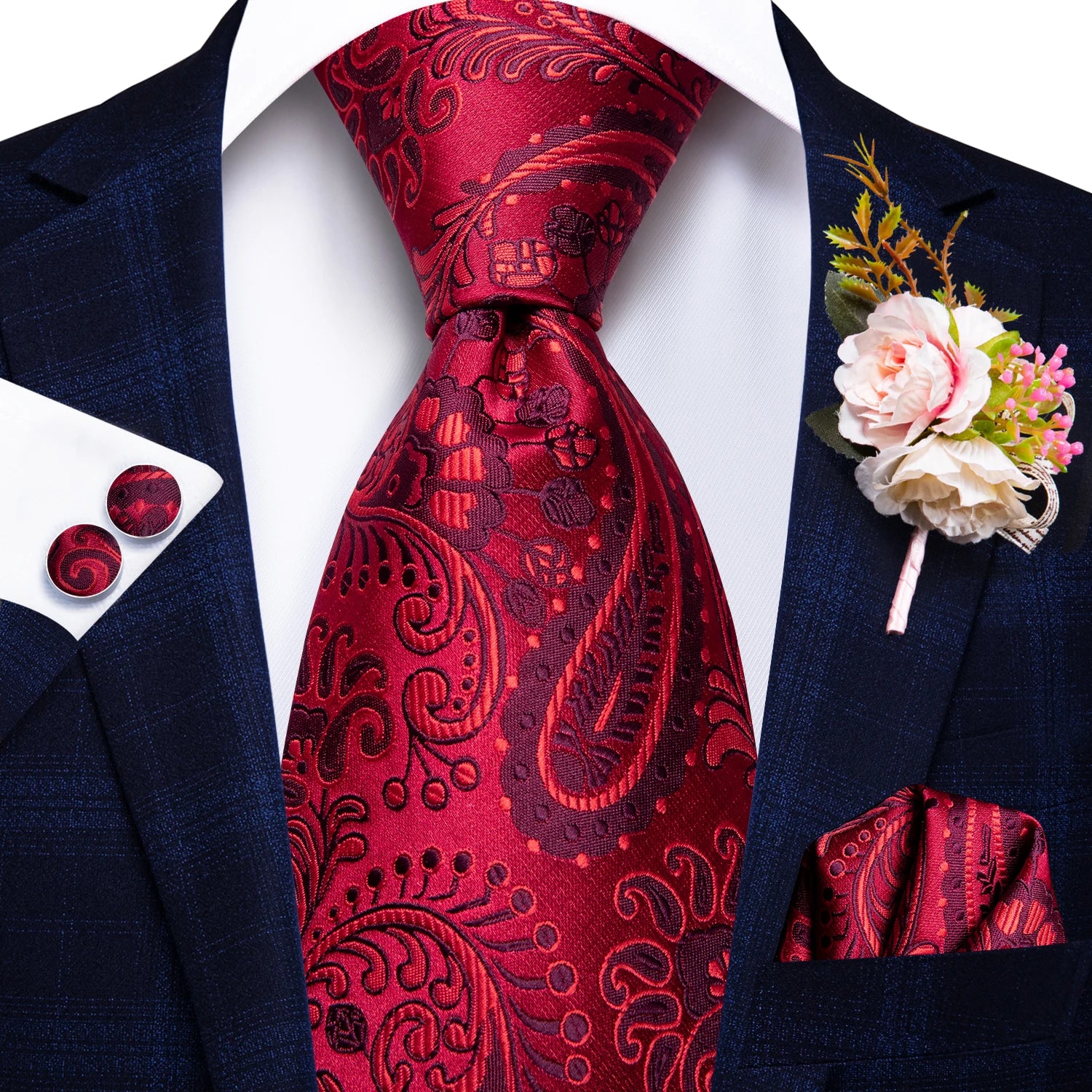 red floral pattern tie with matching cuff links and pocket square