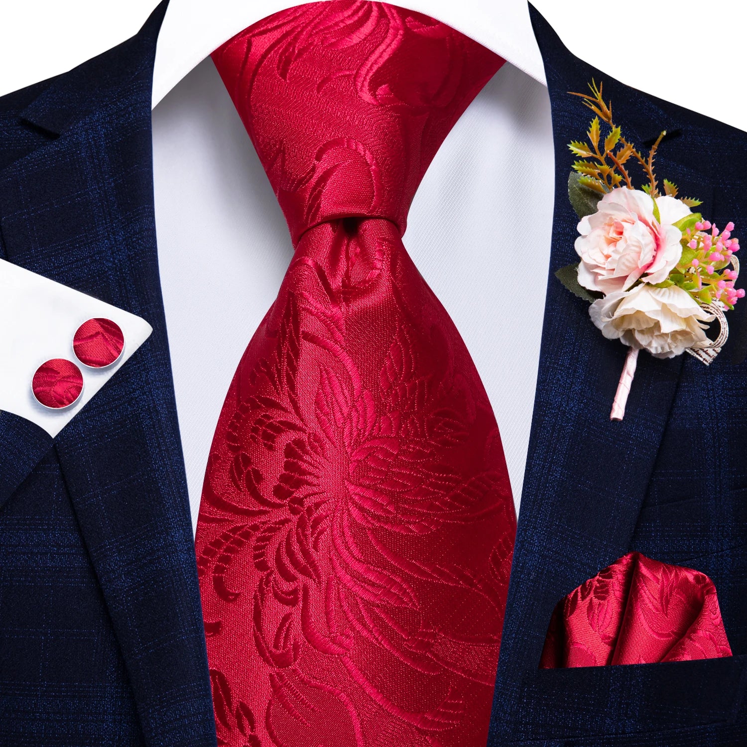 red floral pattern tie with matching cuff links and pocket square