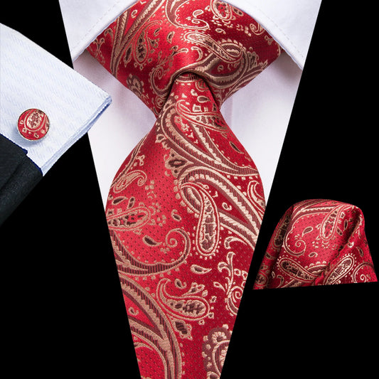 red paisley tie with cuff links and pocket square